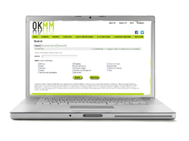 photo of a laptop displaying the OKMM Clearinghouse Home page