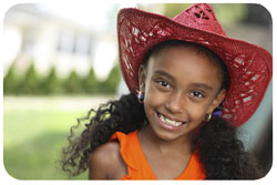 cute young girl wearing a red hat